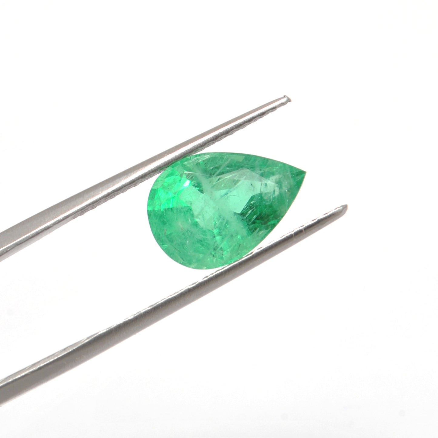 Kanika Creations’ natural Zambian emerald, 3.85 carats, pear faceted, 13x9mm, glowing with lush green tones and exceptional sparkle.