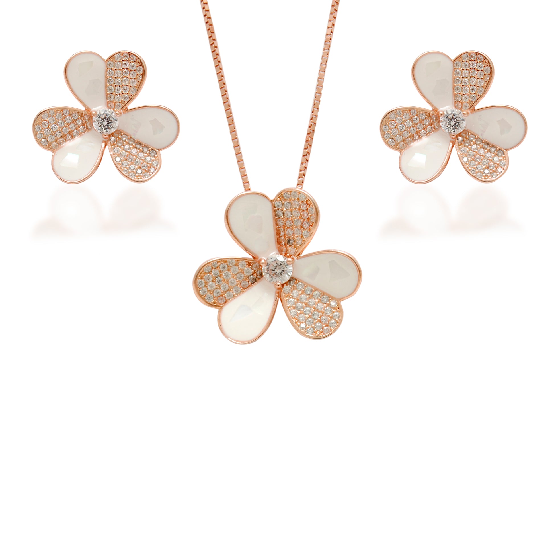 Flower-shaped jewelry set with rose gold and white elements on a white background