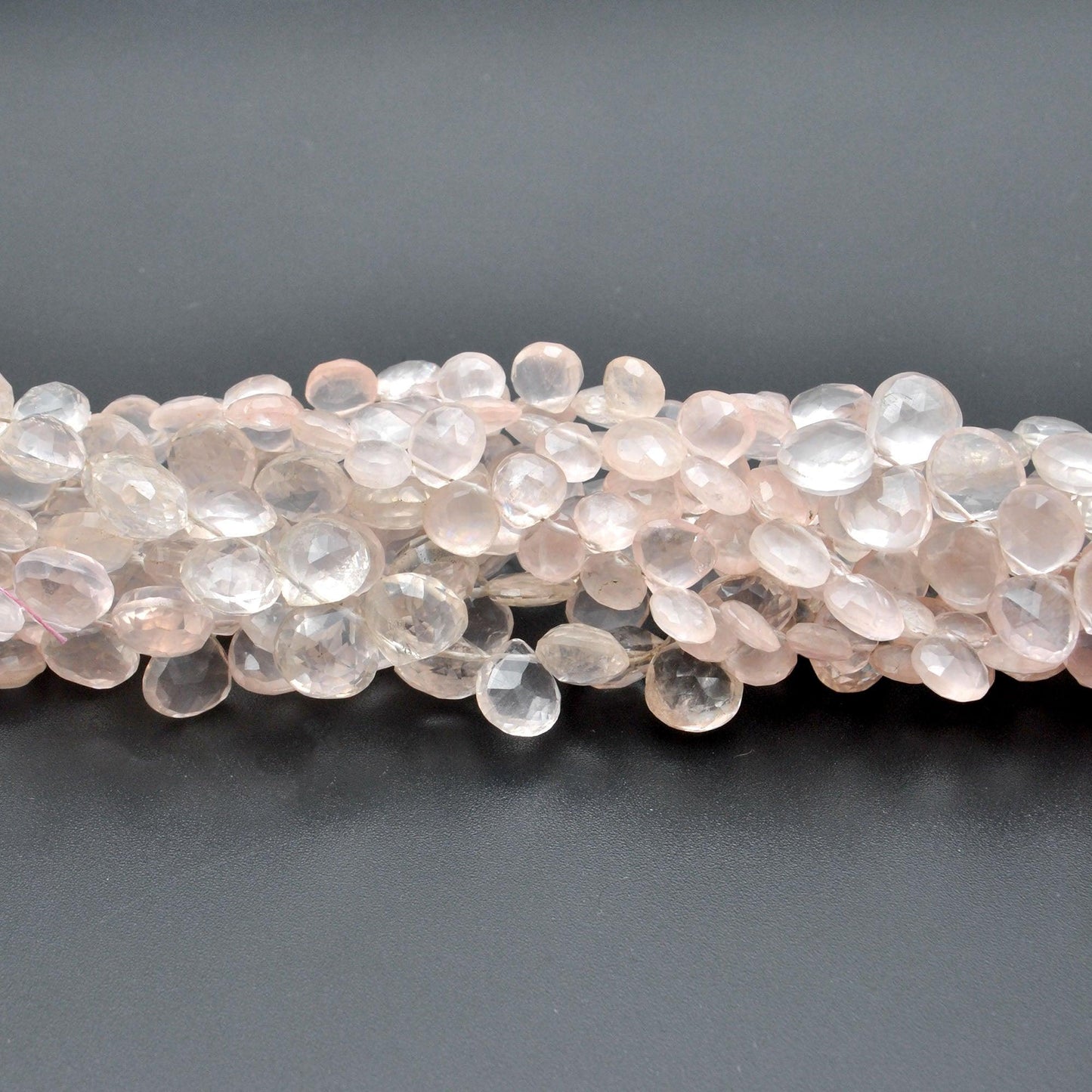 Rose quartz faceted heart beads Jaipur wholesale scale reference