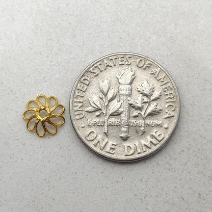 18K gold fancy end spacer cap 7mm styled on strand ending