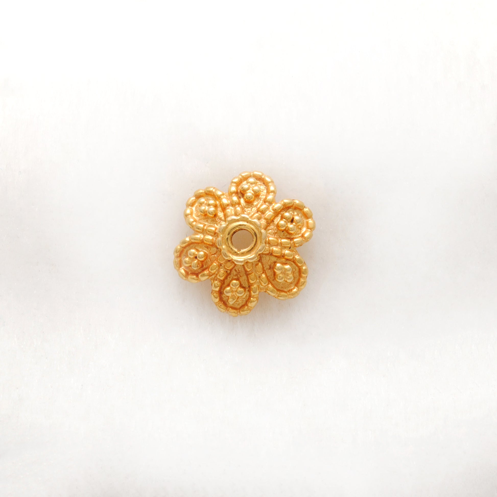 18K gold fancy floral cap styled on statement necklace
