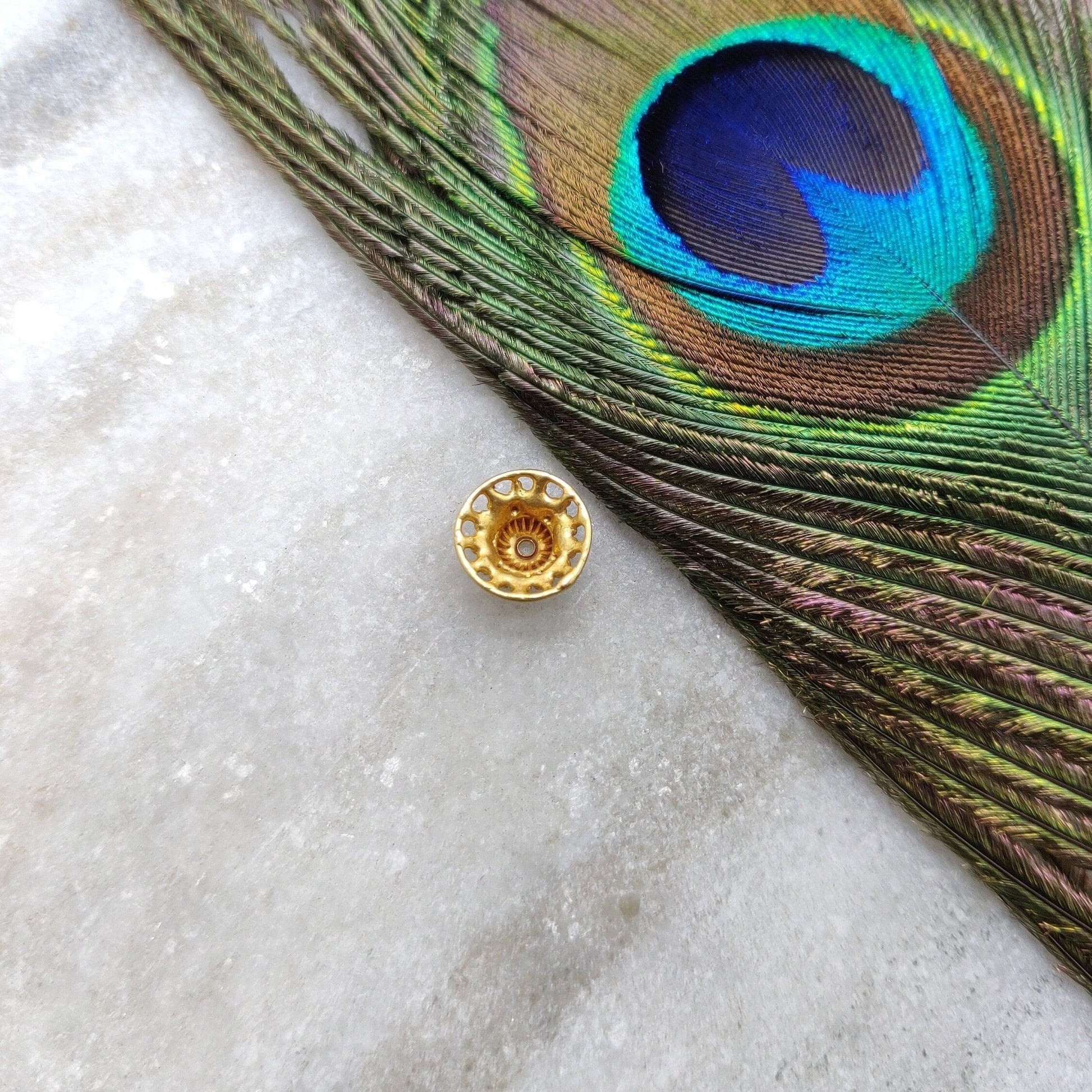 18K gold fancy spacer caps - close-up ornate detail