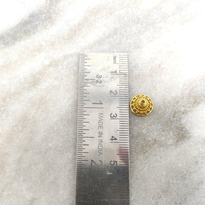 18K gold fancy spacer caps styled on statement jewelry