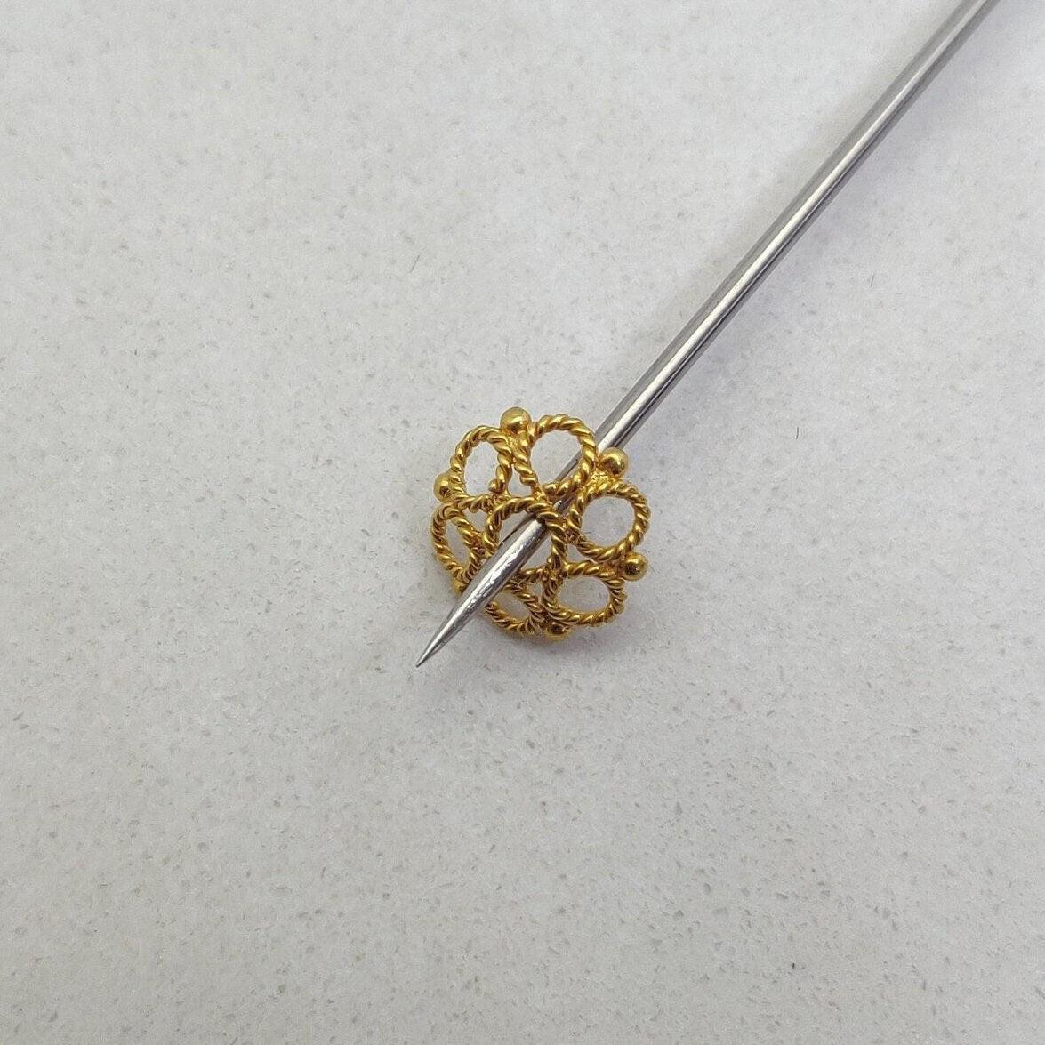 18K gold filigree end caps 9mm - close-up handmade lacework