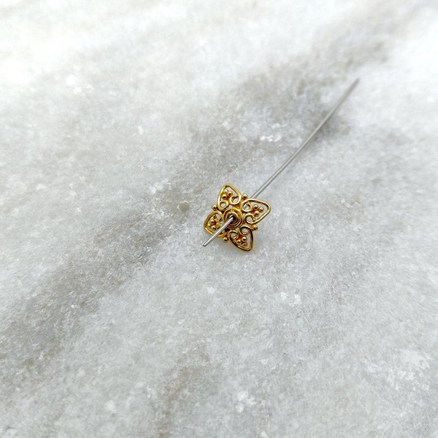 18K gold filigree star spacer cap 10mm lacework close-up