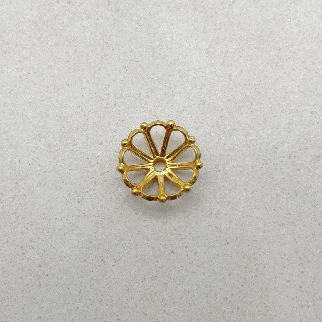 18K gold flat disc floral cap - overhead view