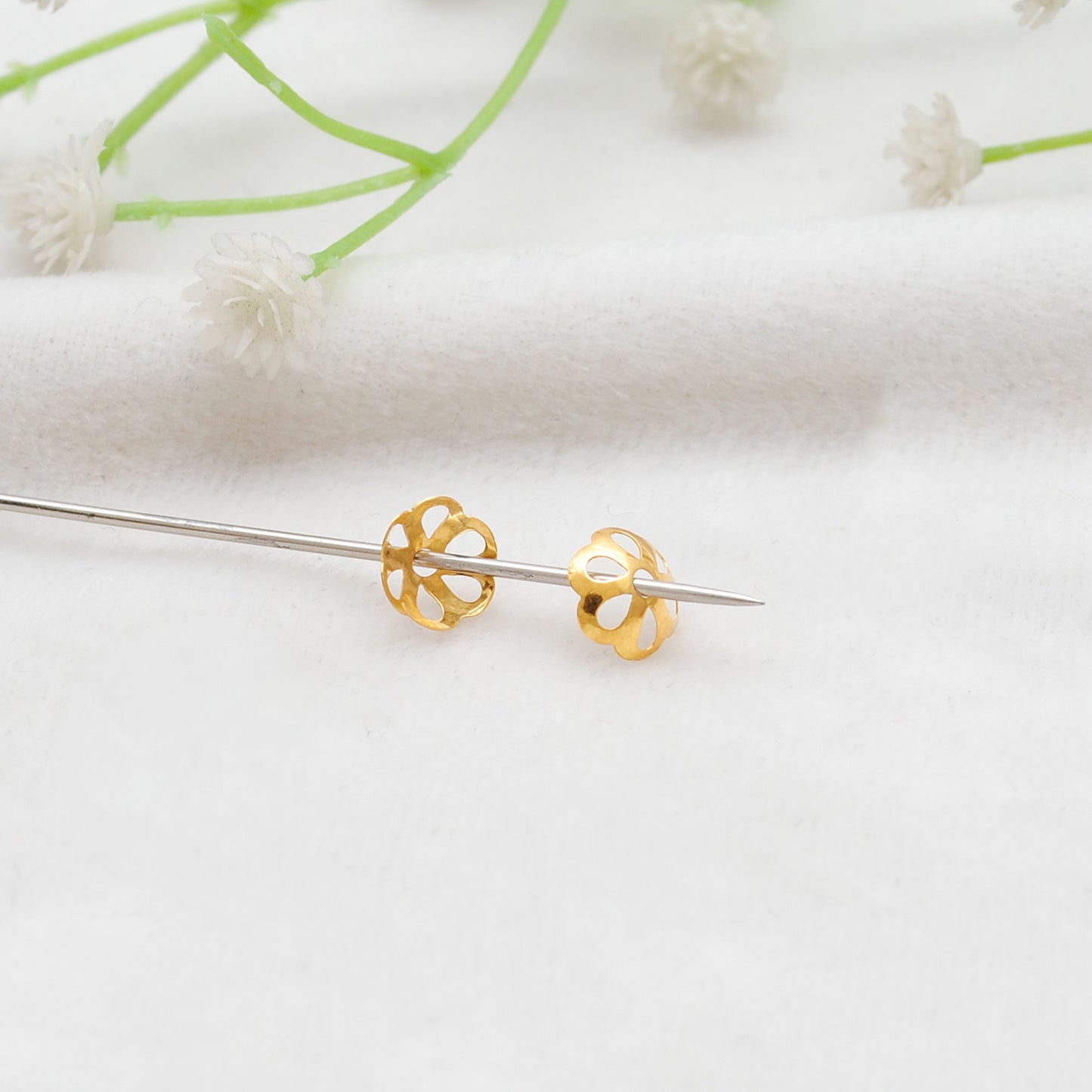 18K gold floral cap 8mm styled on gemstone strand