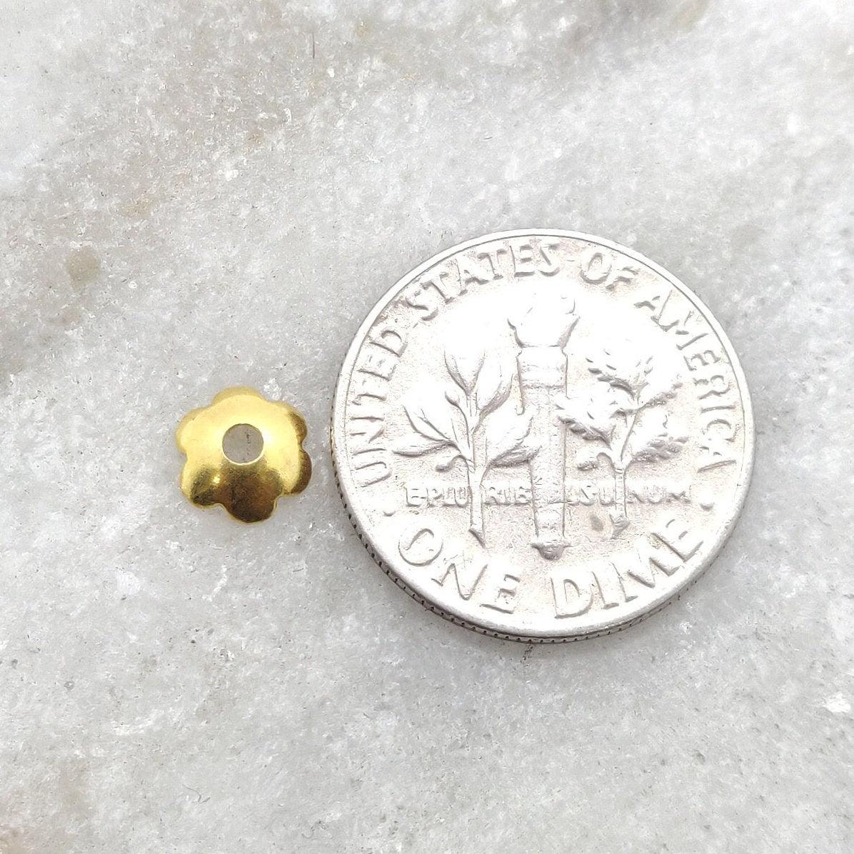 18K gold floral plain caps 2x6mm - overhead view Jaipur
