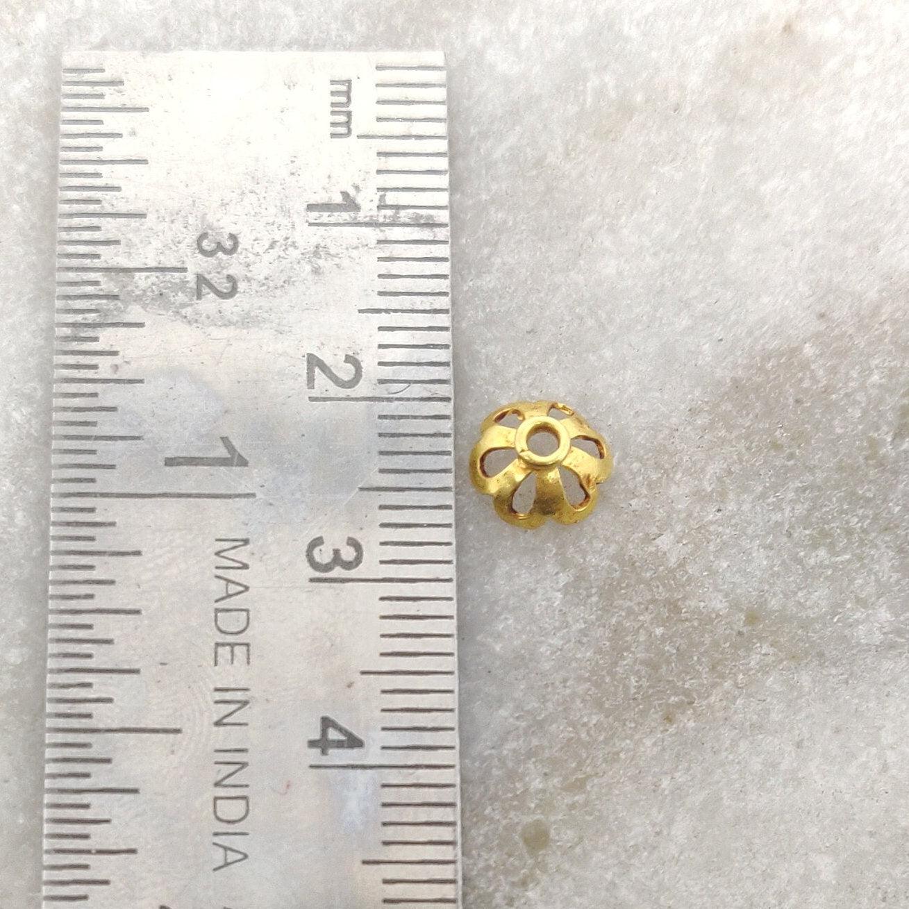 18K gold flower bead cap 4x7mm styled on delicate necklace