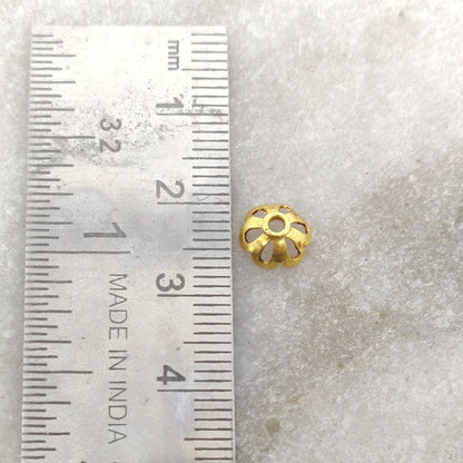 18K gold flower bead cap 4x7mm styled on delicate necklace