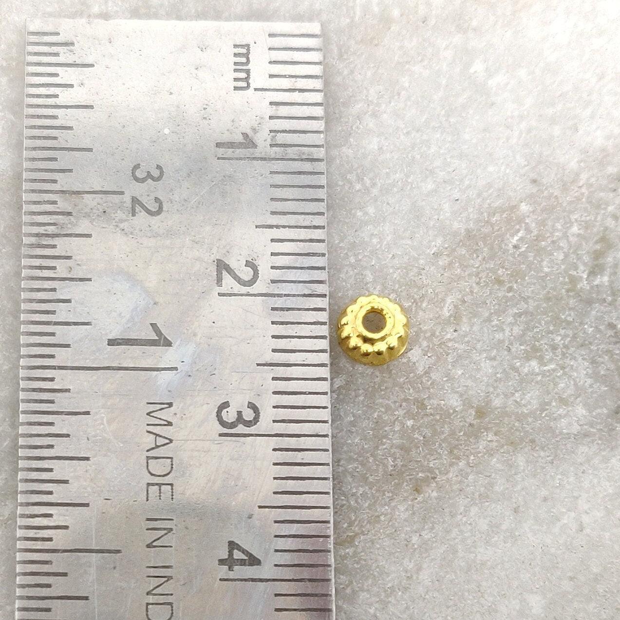 18K gold slim spacer bead cap 2x5mm styled on delicate jewelry