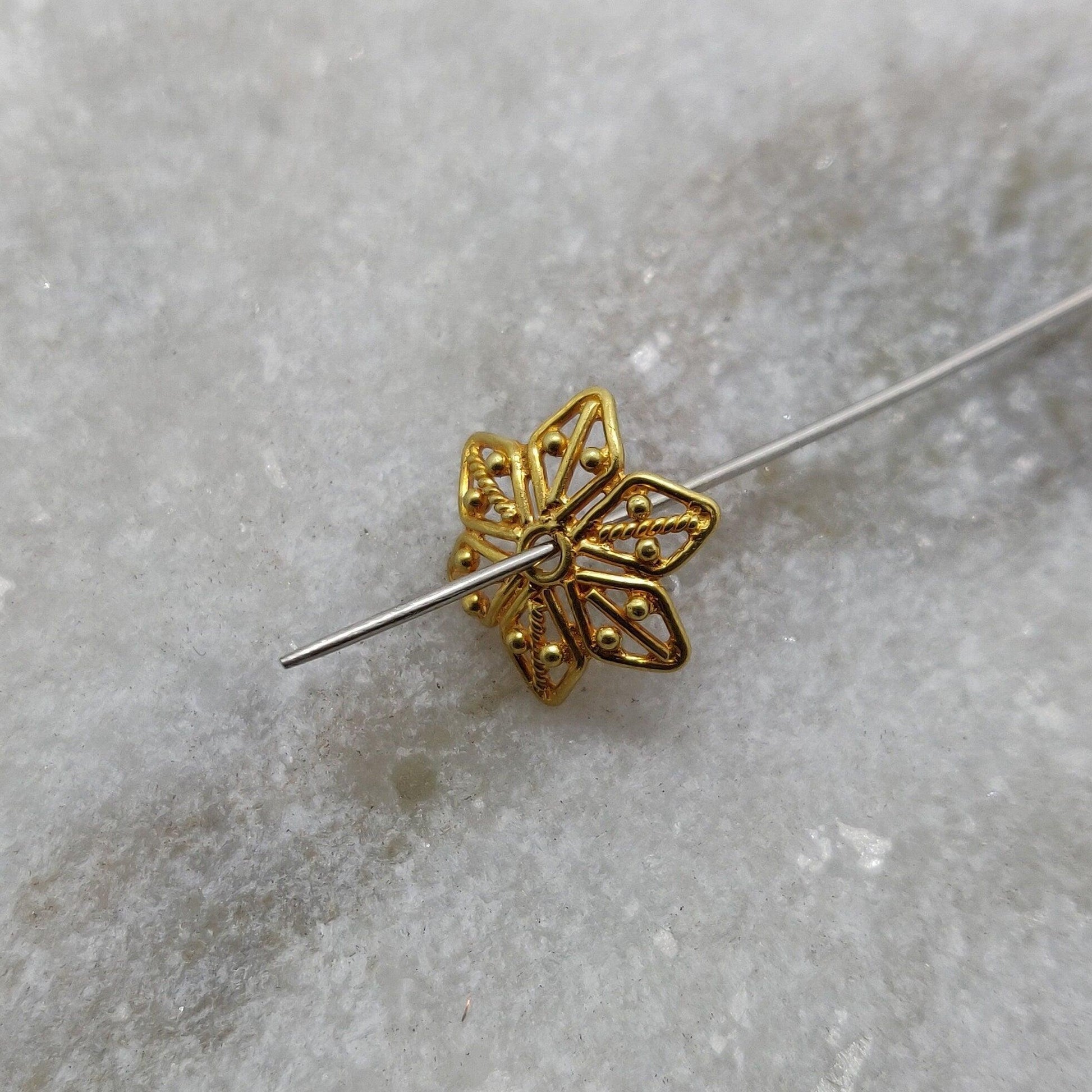 18K gold star bead cap - close-up celestial points detail
