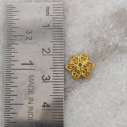 18K gold star bead cap styled on celestial jewelry