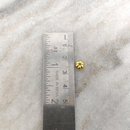 18K gold floral bead caps 2x6mm styled on delicate jewelry