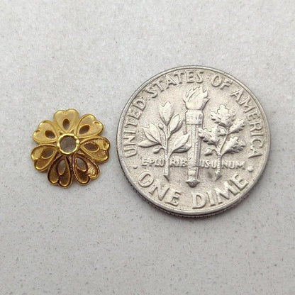 18K gold floral spacer cap 9mm styled on gemstone strand