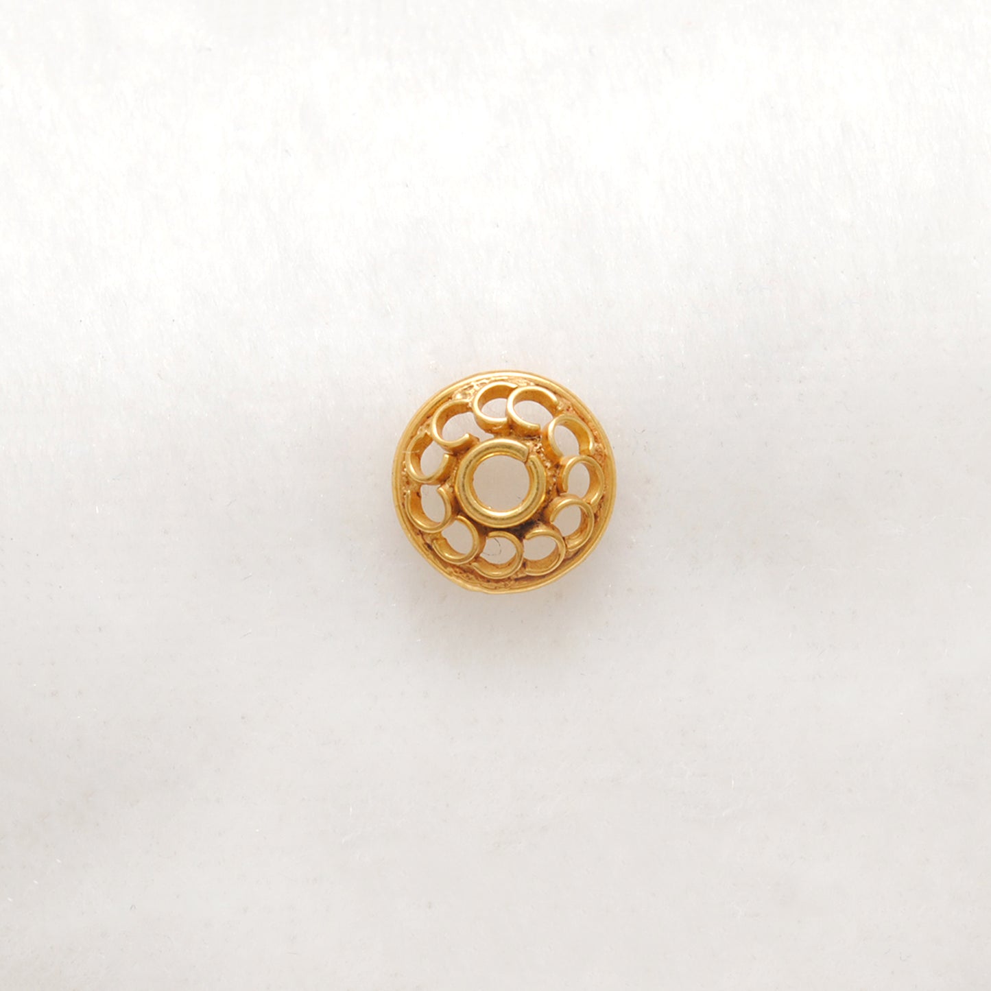 18K gold flower bead cap 7mm styled on jewelry