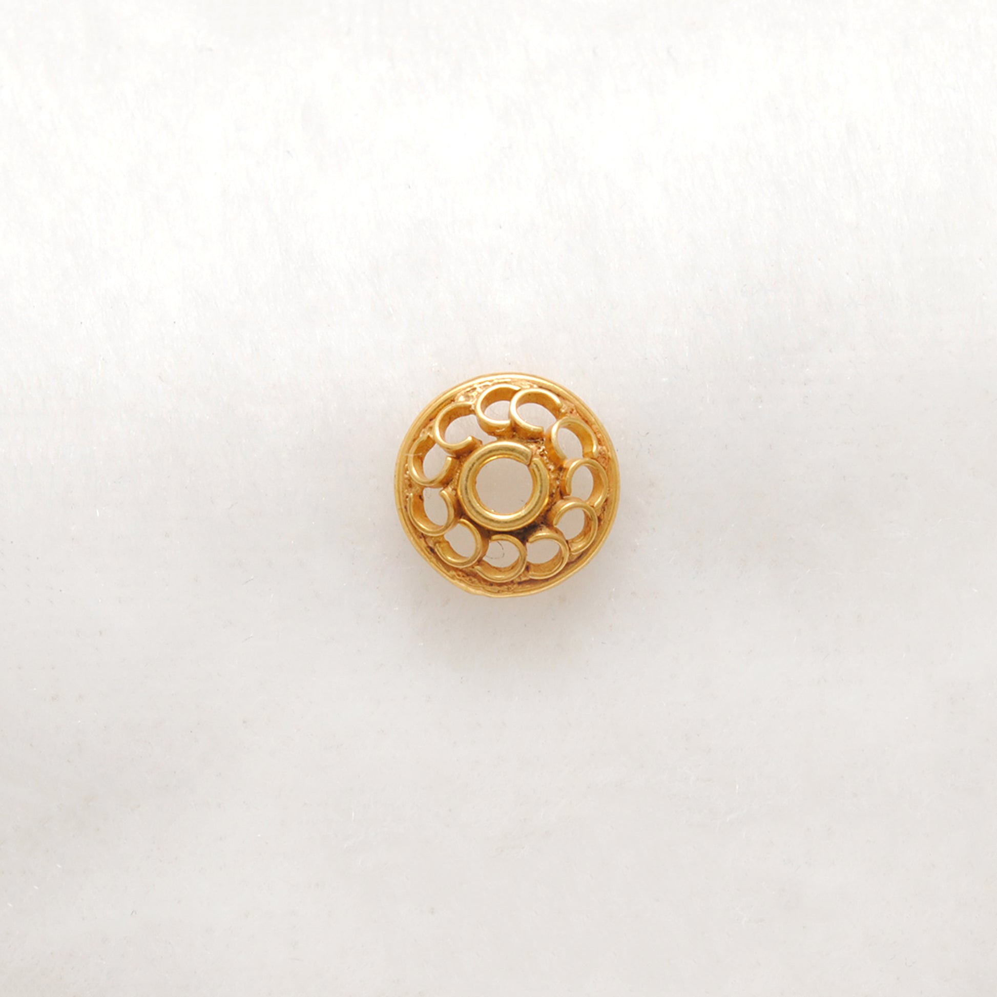 18K gold flower bead cap 7mm styled on jewelry
