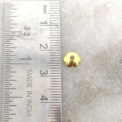 18K yellow gold plain bead cap 6mm styled on minimalist jewelry