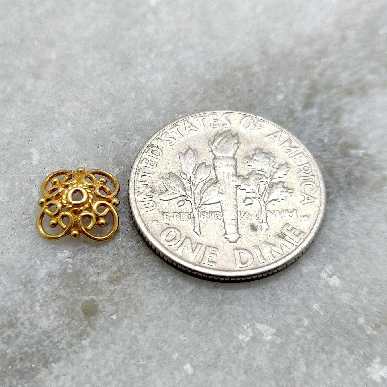 18K yellow gold spacer bead cap styled on gemstone strand