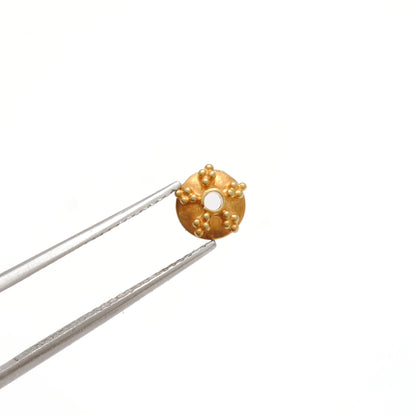 6mm 18K gold fancy cap styled on dainty jewelry