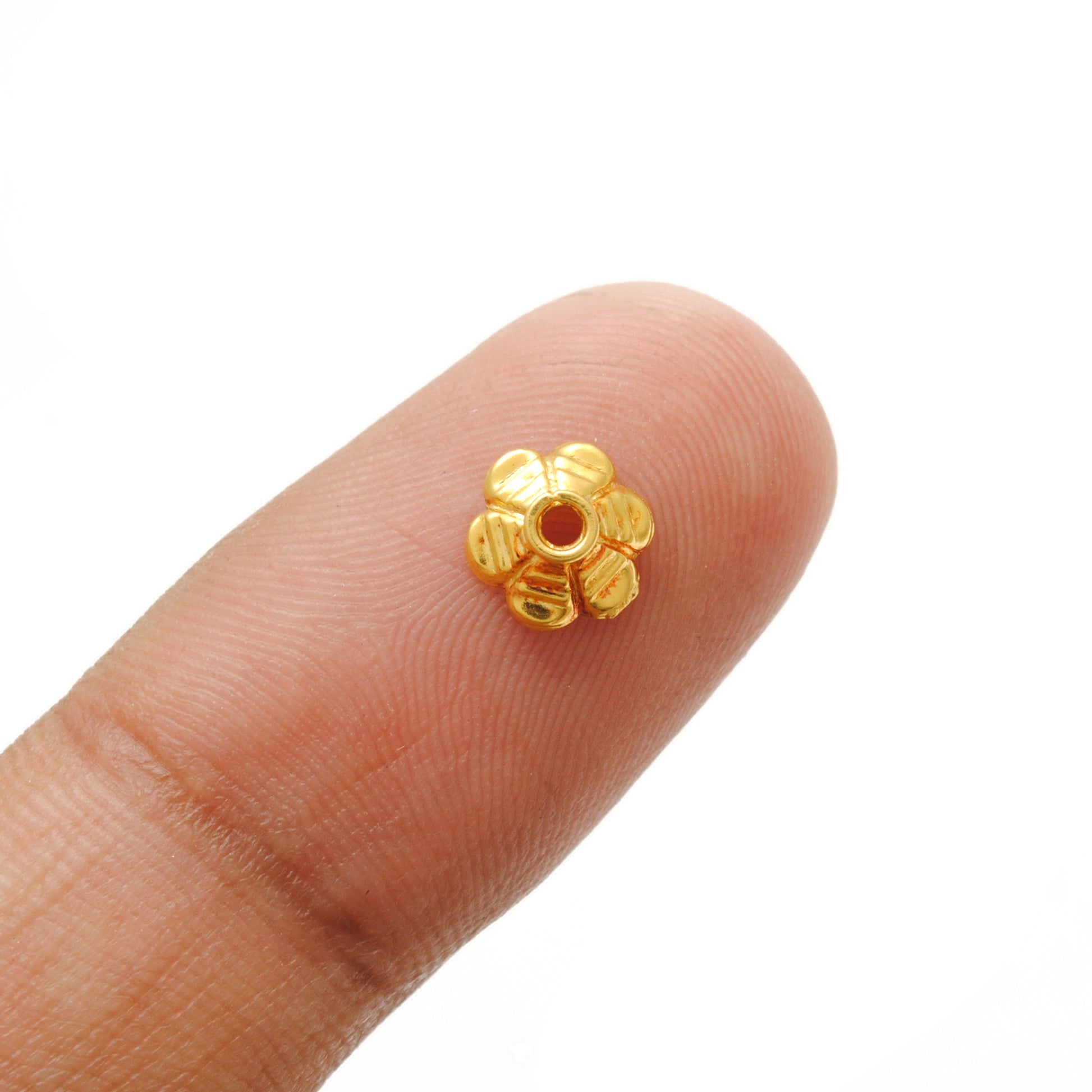 7mm 18K gold floral cap - overhead view Jaipur