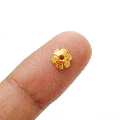 7mm 18K gold floral cap - overhead view Jaipur