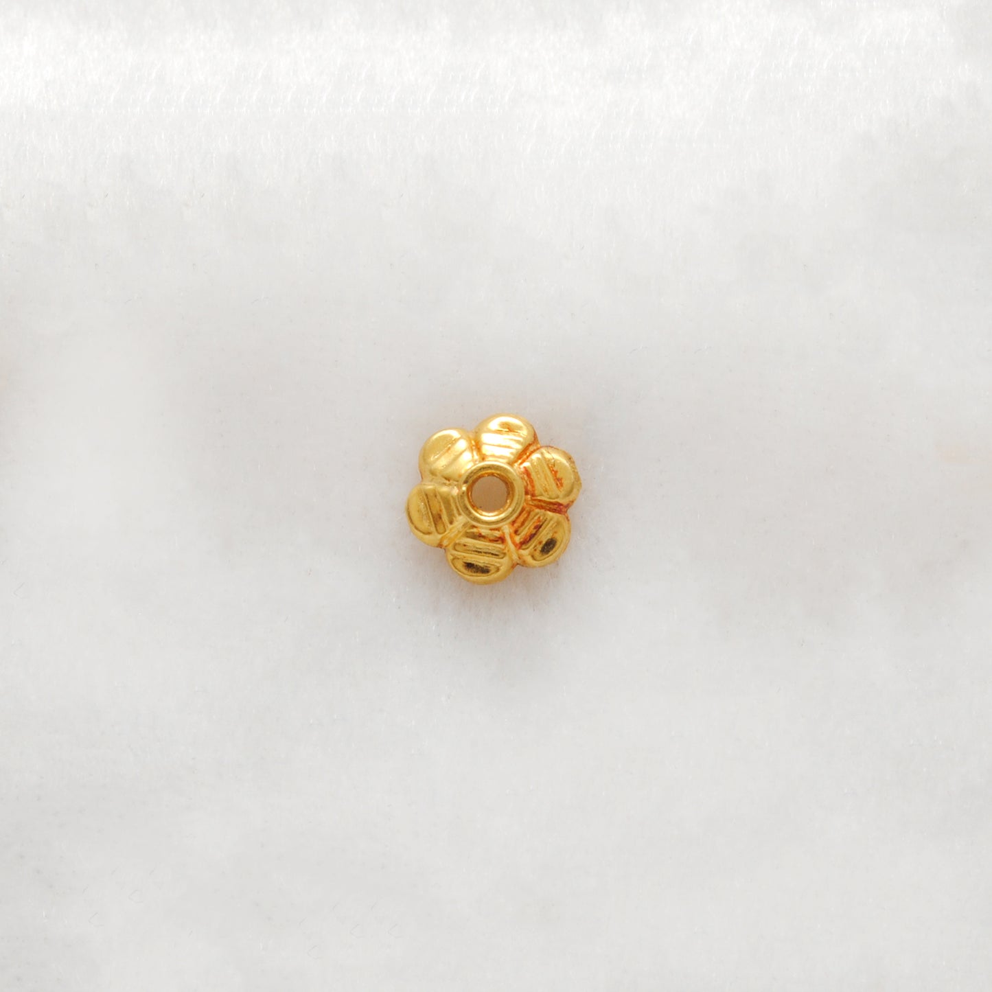 7mm 18K gold floral cap styled on gemstone bracelet