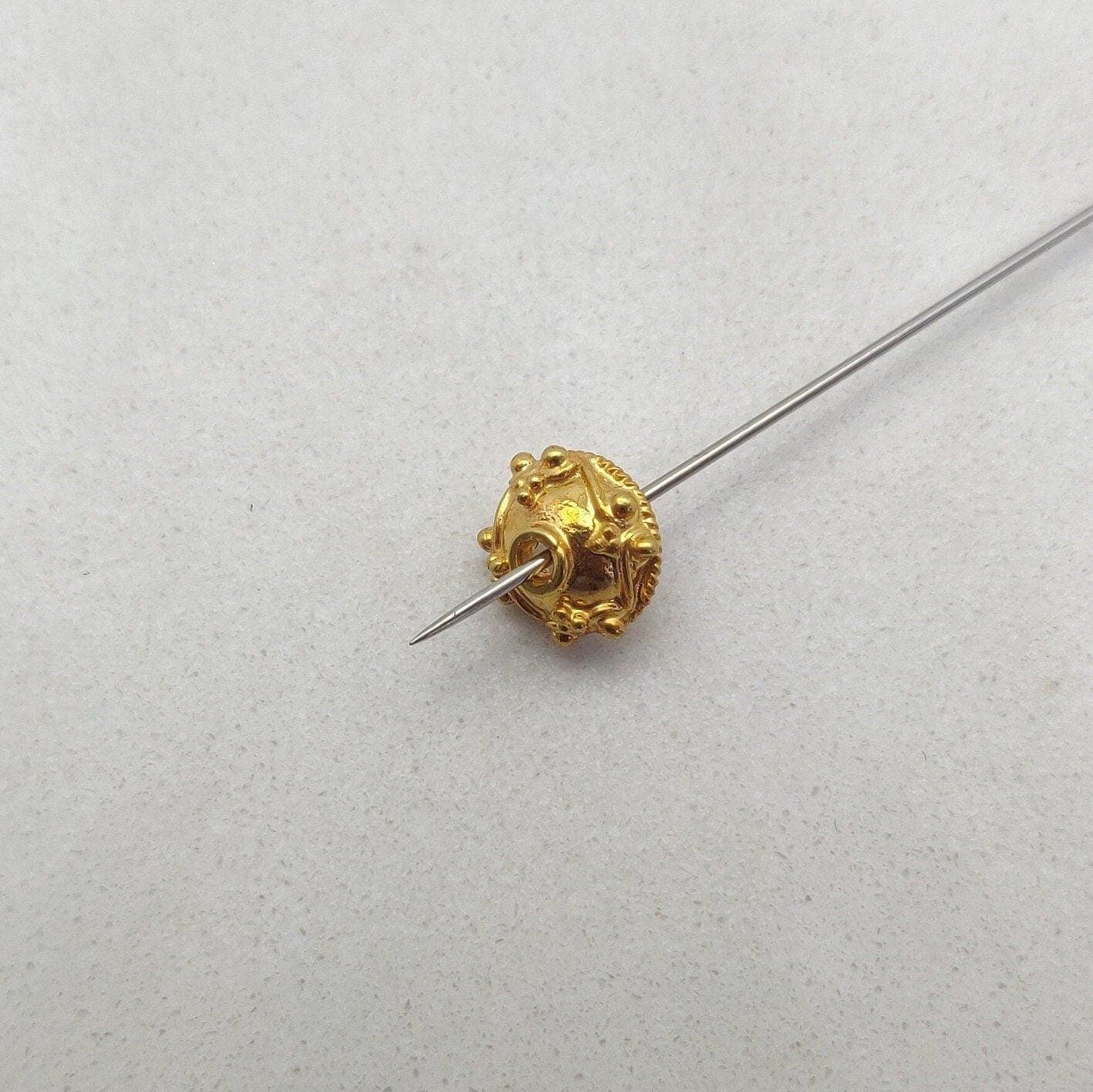 9mm 18K gold spacer bead cap close-up detail