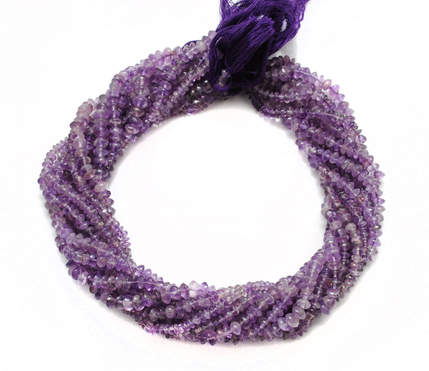 Amethyst button beads flat disc shape - close-up purple detail
