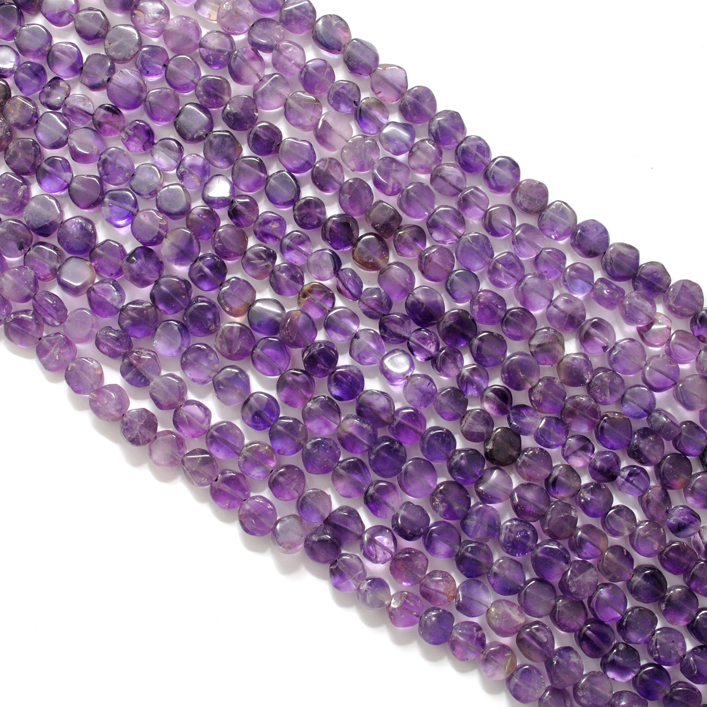 Amethyst coin beads flat circular - close-up purple detail