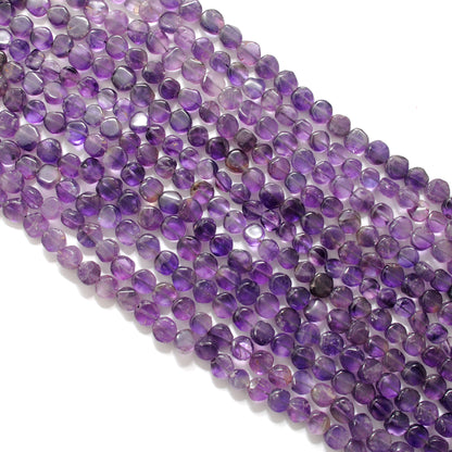 Amethyst coin beads flat circular - close-up purple detail