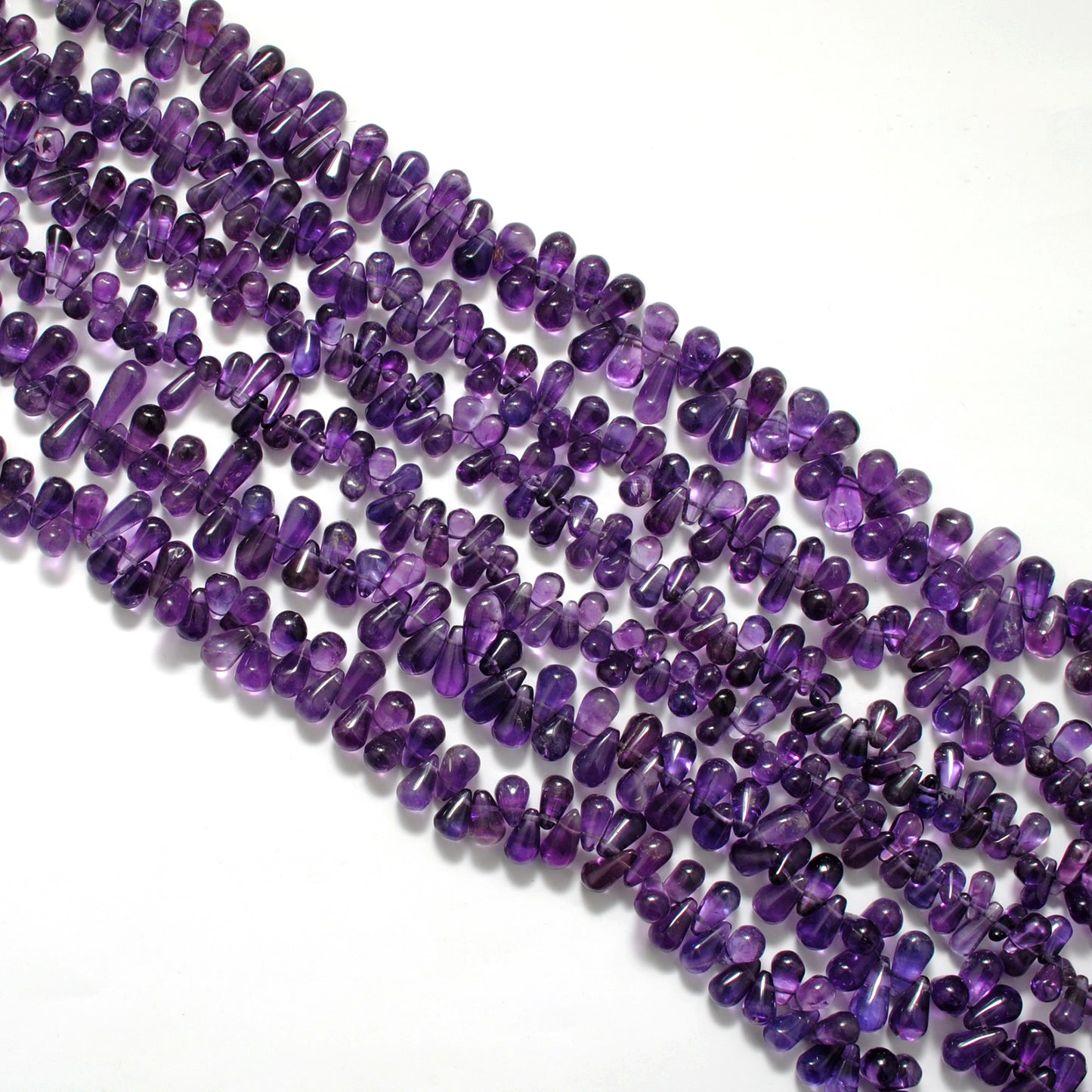 Amethyst drop beads AAA grade - close-up teardrop purple detail
