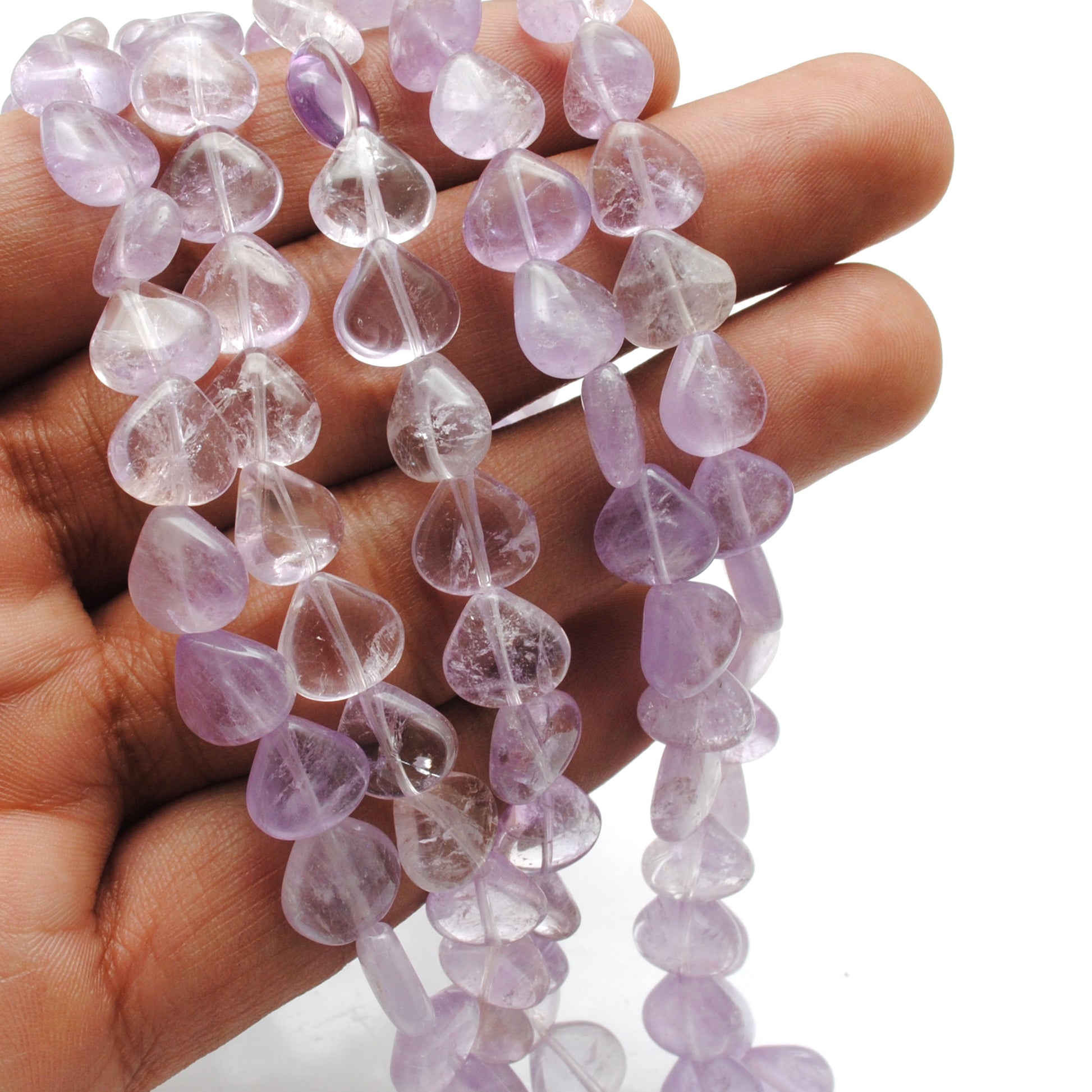 Amethyst heart beads scattered loose - romantic jewelry view