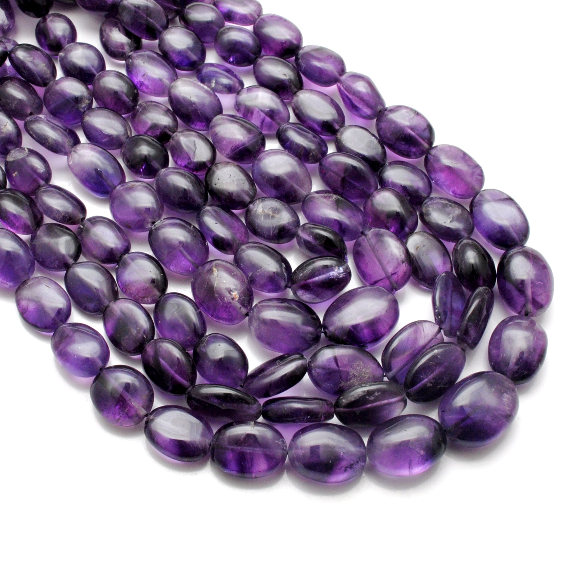 Amethyst nugget beads organic shape - close-up purple unique forms