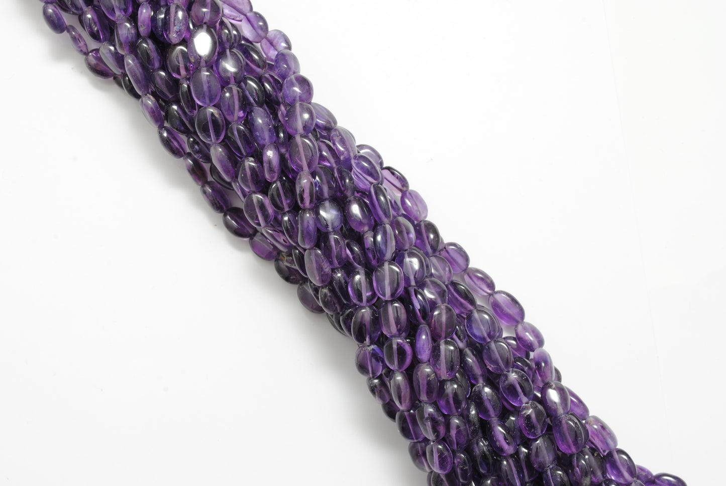 Amethyst small oval beads for dainty jewelry - side profile