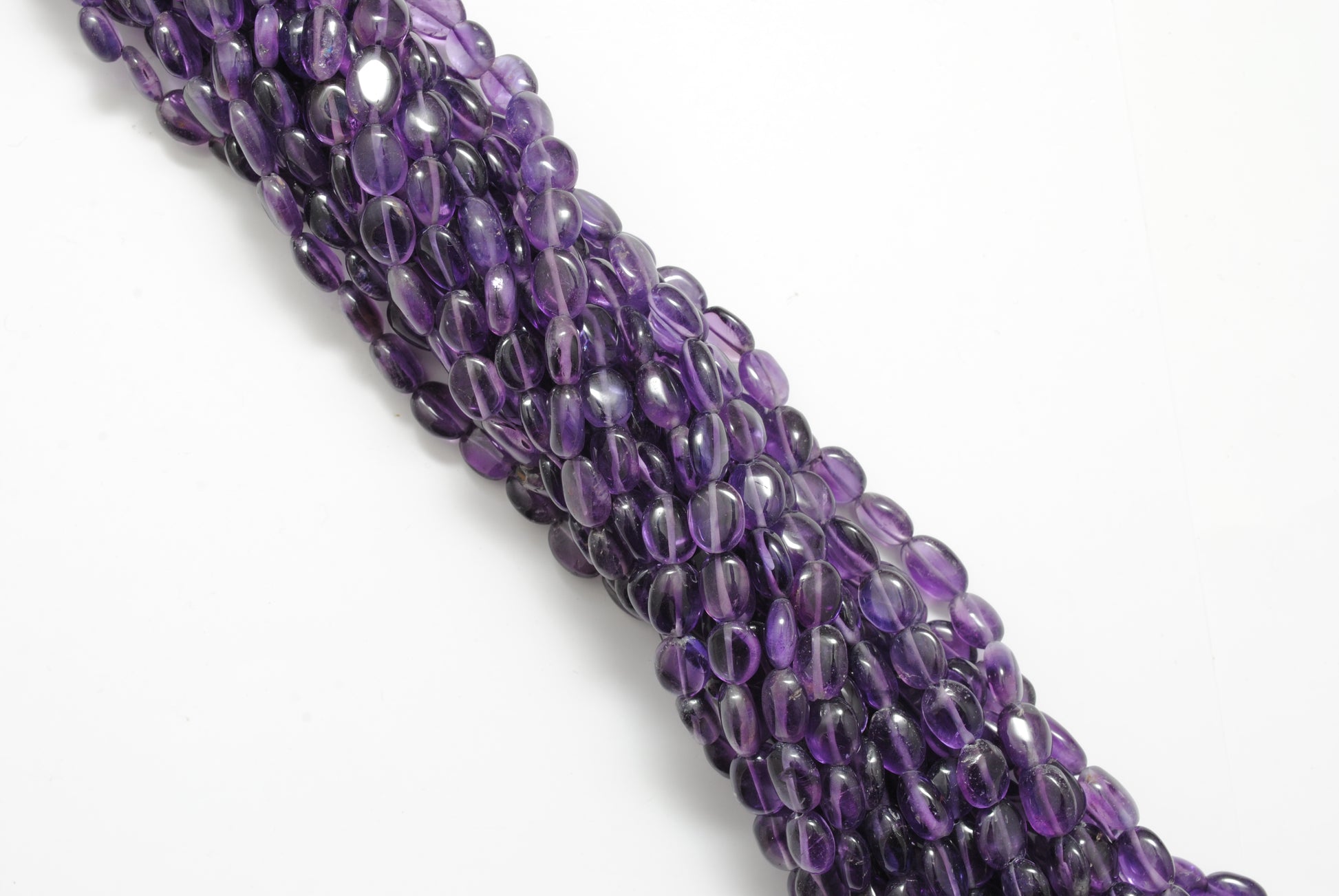 Amethyst small oval beads for dainty jewelry - side profile