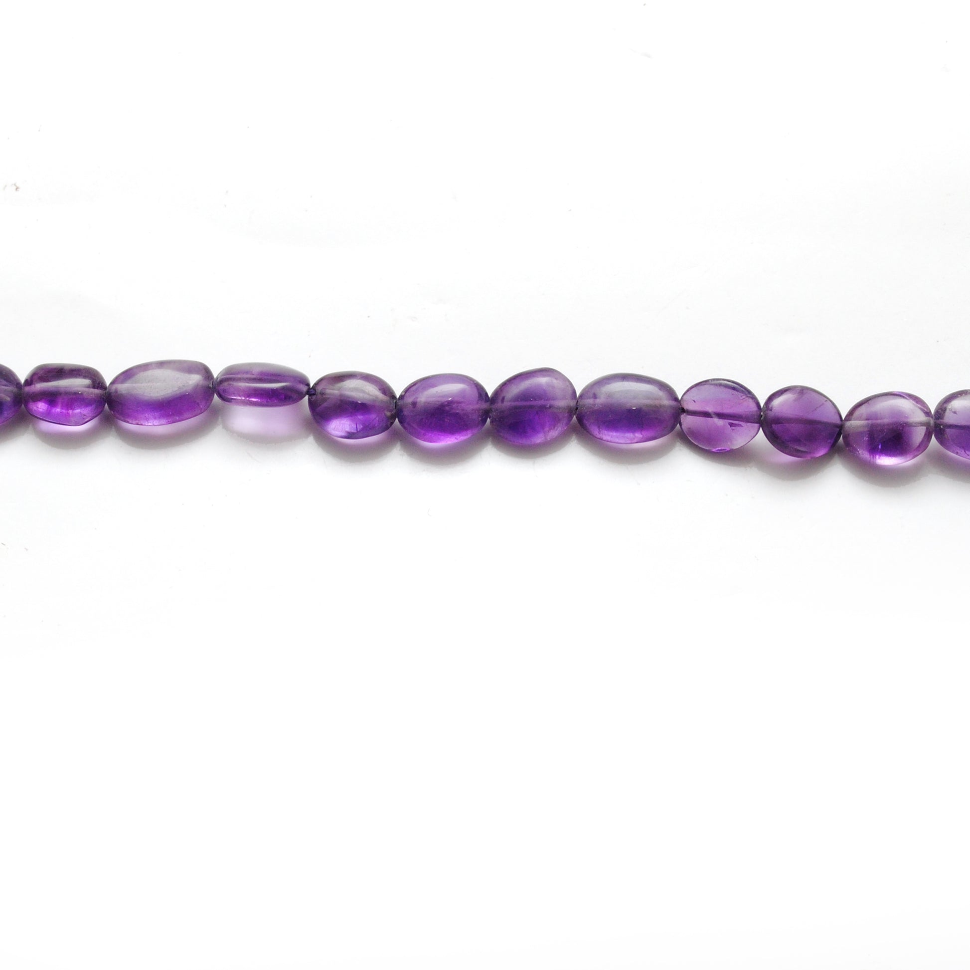 Amethyst oval beads 7x9mm - close-up deep purple color