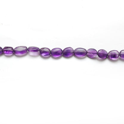 Amethyst oval beads 7x9mm - close-up deep purple color