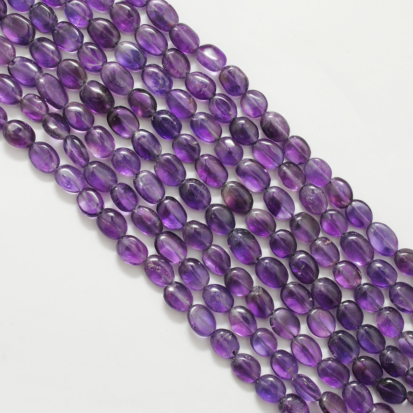 Amethyst large oval beads 8x11mm - close-up rich purple color