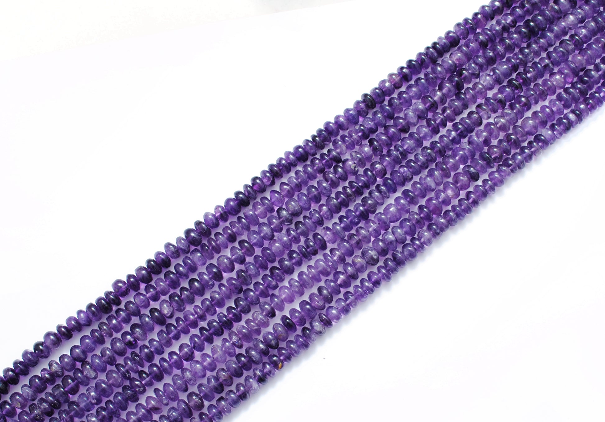 Amethyst rondelle beads 9mm - close-up large purple disc detail