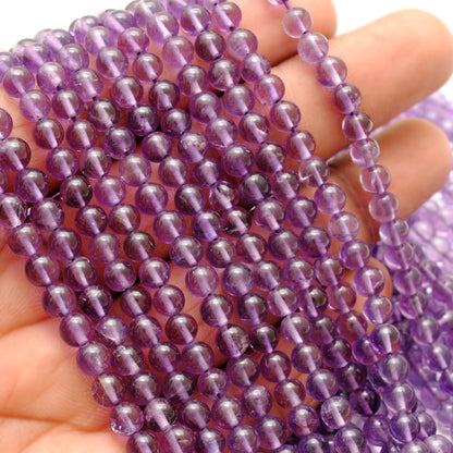 Natural amethyst round beads 4mm - scale reference