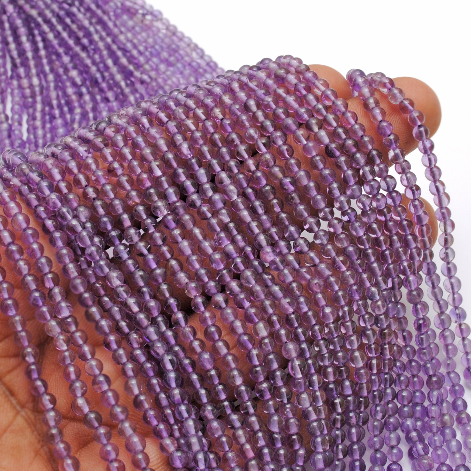 Amethyst smooth round beads 3mm - close-up tiny purple detail