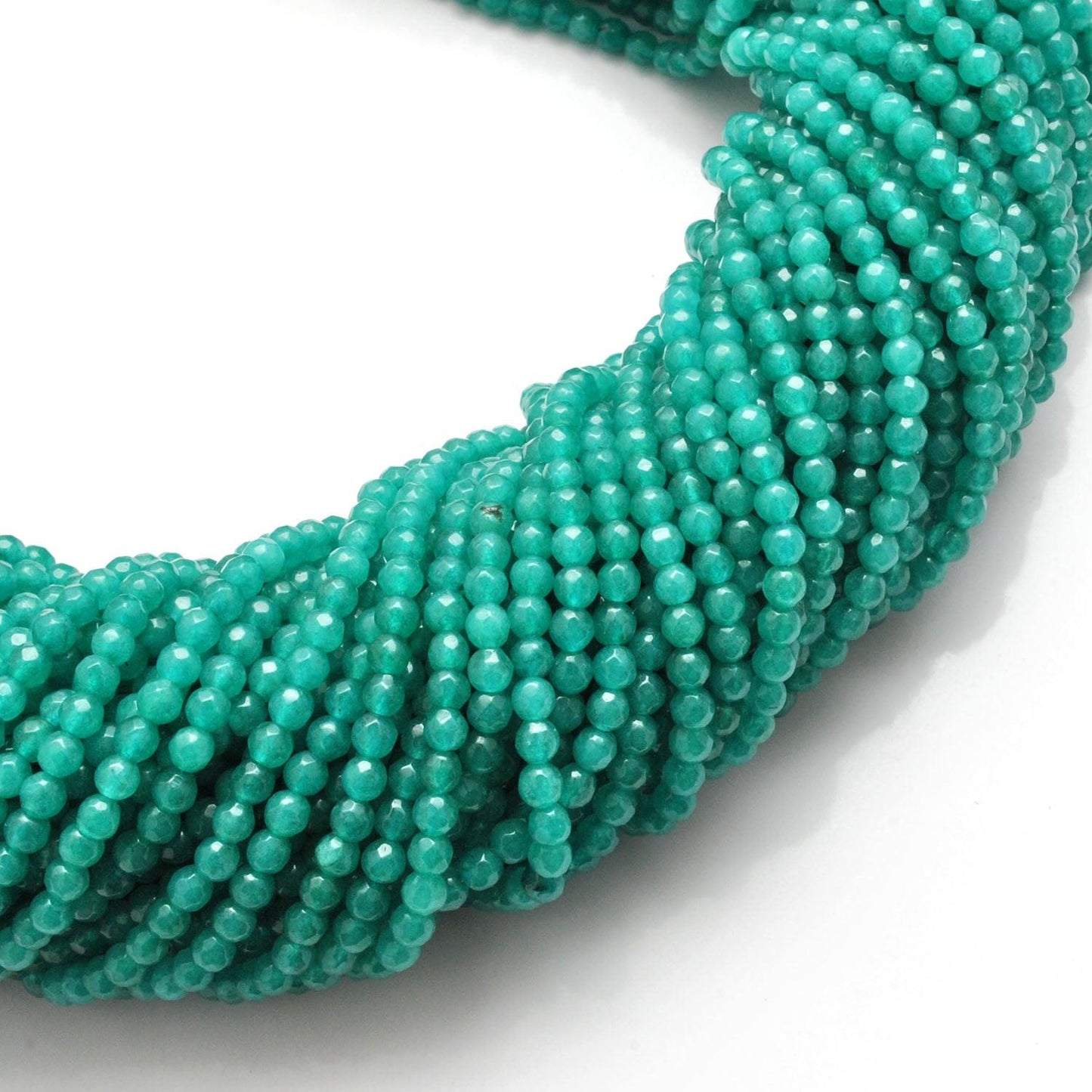 Aqua quartz faceted beads - side profile light refraction
