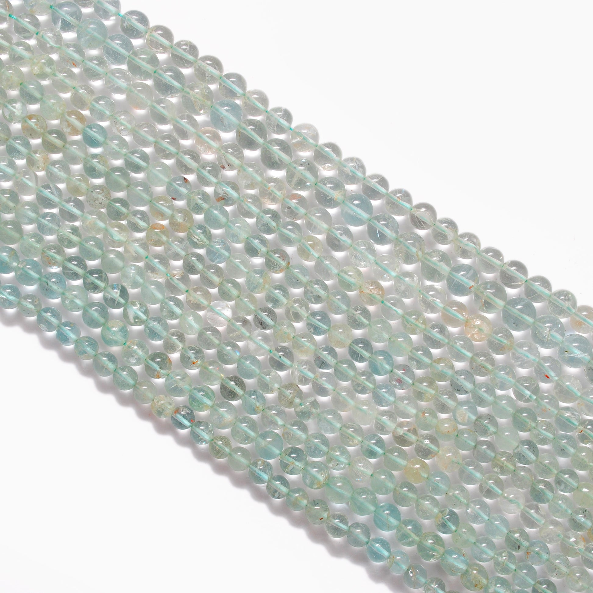 Aquamarine 6-6.5mm beads detail shot - premium clarity blue