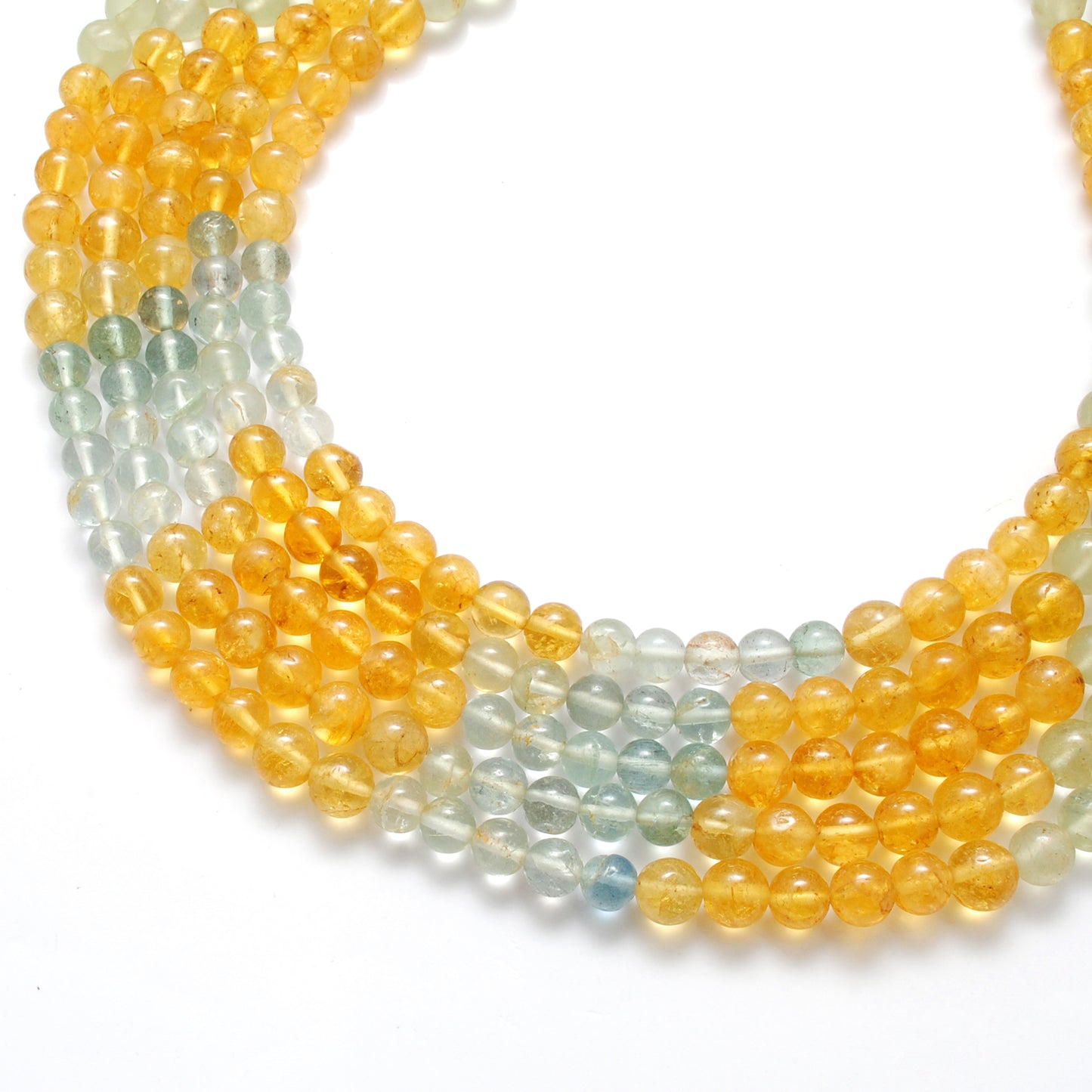 Aquamarine 6-7mm beads close-up ocean-blue green colour