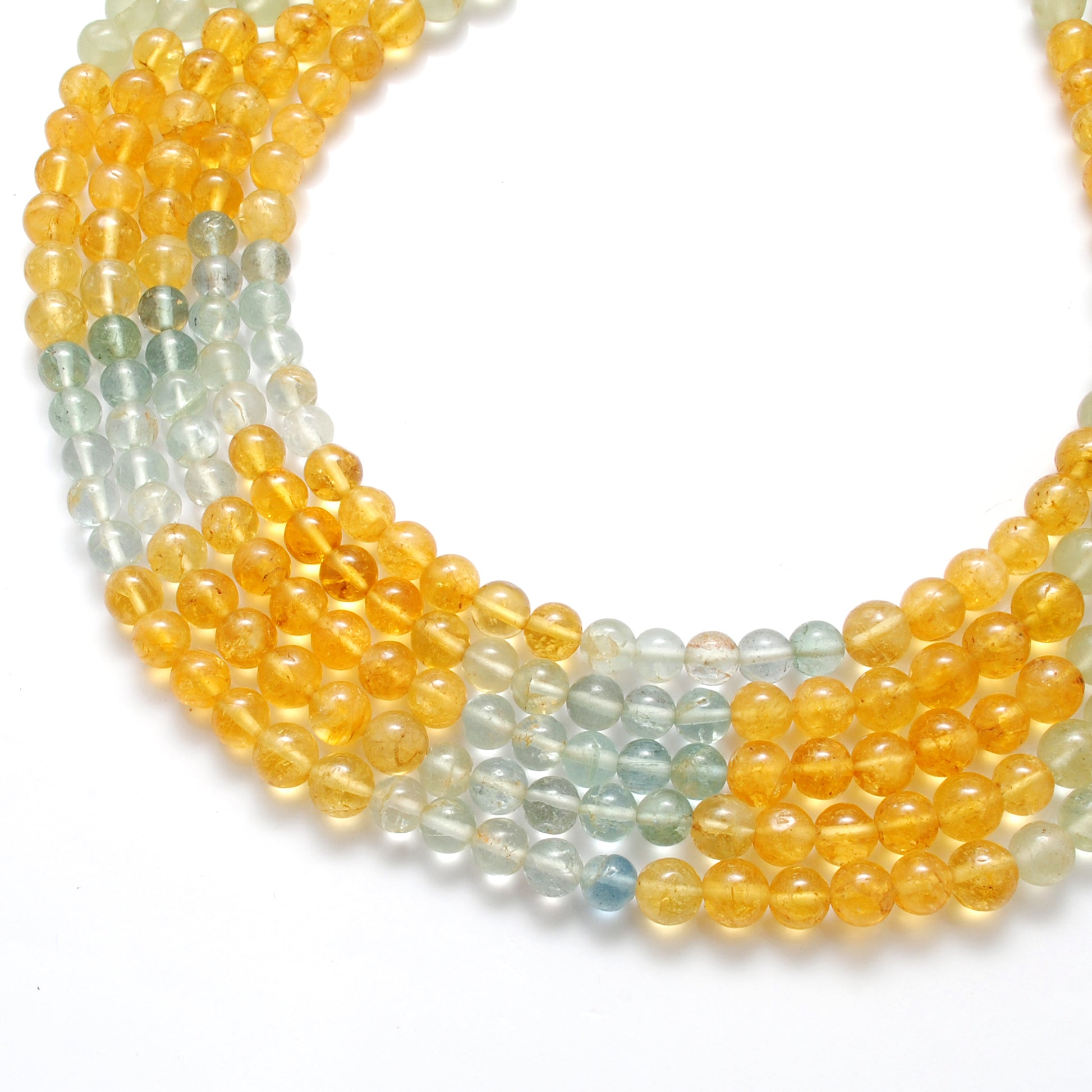 Aquamarine 6-7mm beads close-up ocean-blue green colour