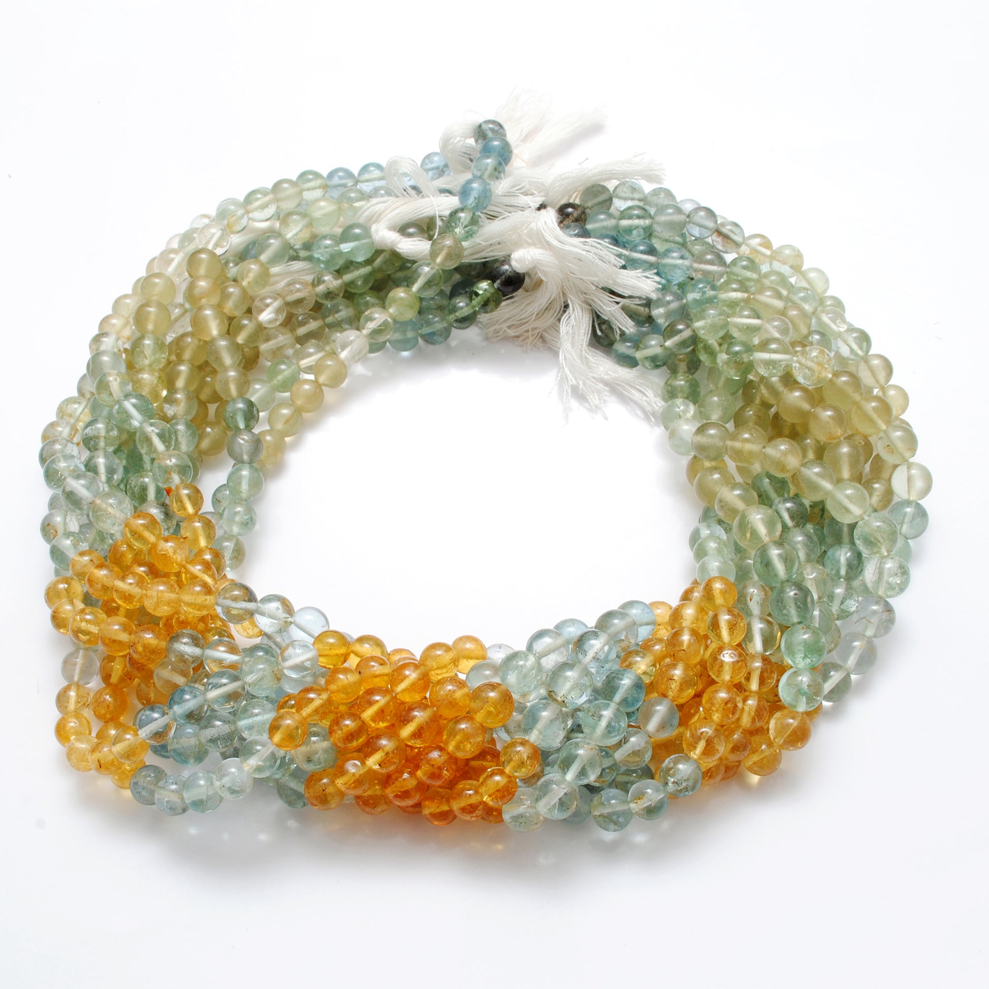 Aquamarine 6-7mm beads detail shot - natural ocean colour