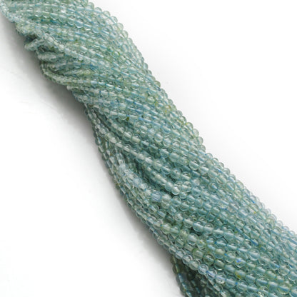 Aquamarine gemstone beads strand - side profile pale blue color