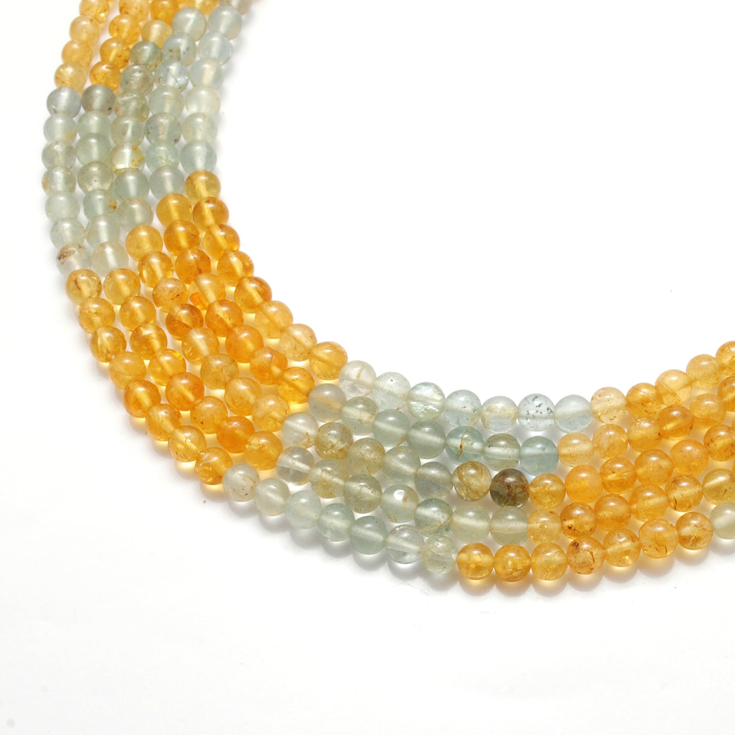 Aquamarine 5mm beads - light through translucent gemstone