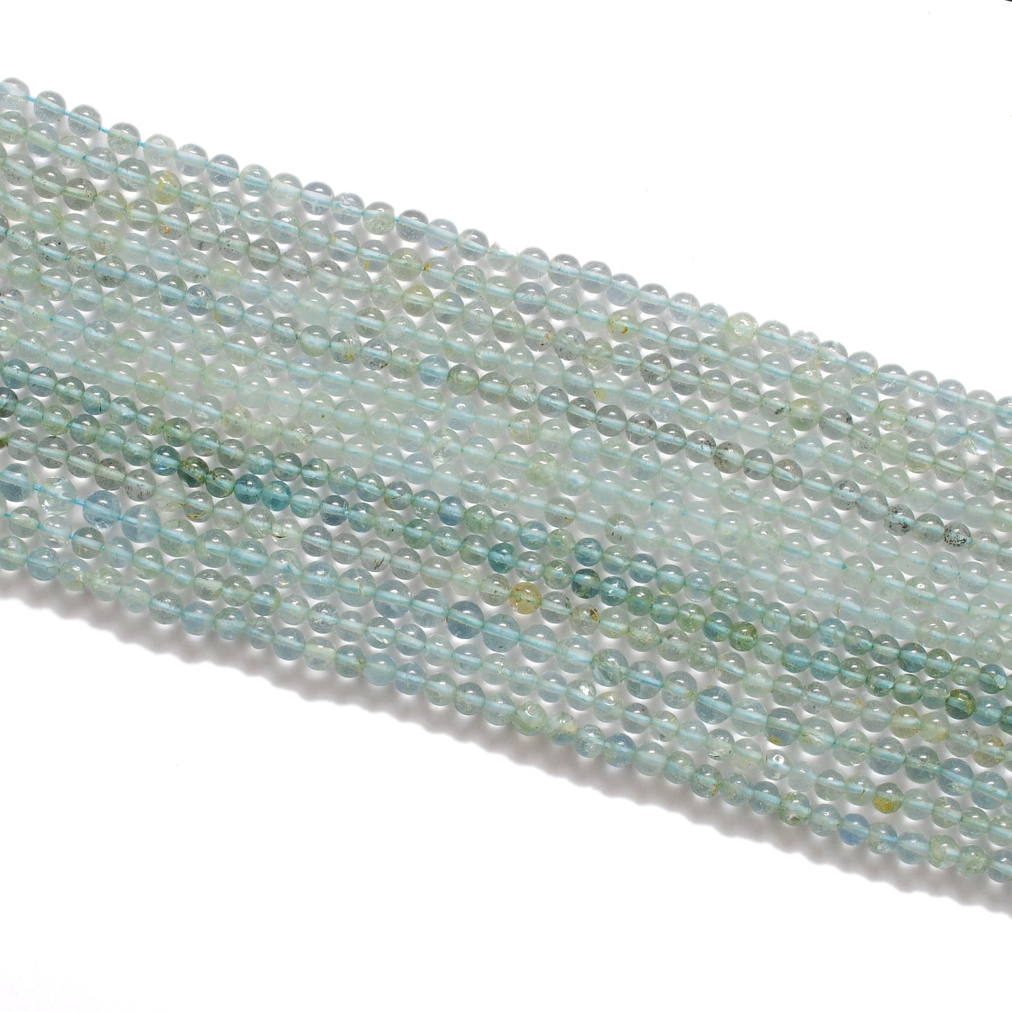 Aquamarine round beads 4-5mm - close-up blue-green color range